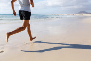 Person running on the beach