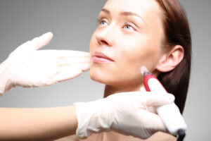 Woman receiving a facial treatment