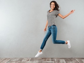 Joyful woman jumping