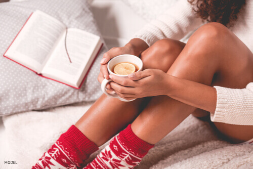 Girl holding hot choclate