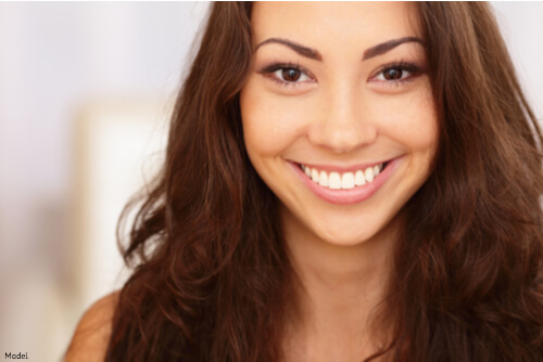 Woman with clear skin after a chemical peel treatment